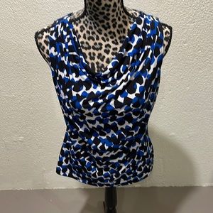 Calvin Klein sleeveless tank for under jackets or sweater or wear alone.